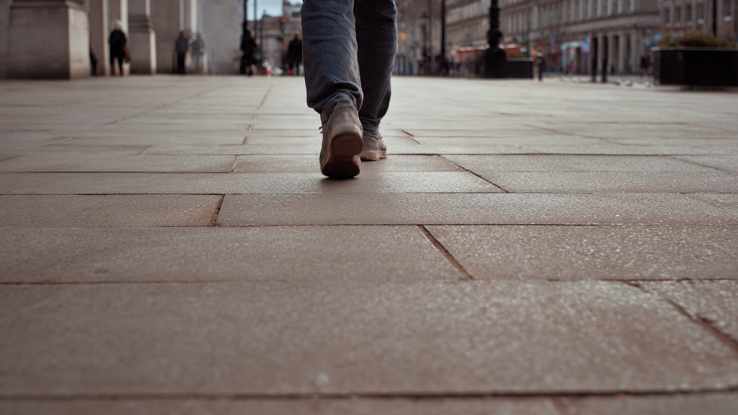 Off-the-beaten-path London walks showing a slow walking pace along a quiet city pavement away from busy tourist routes